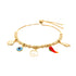 The Mega Lucky Charm Adjustable Bracelet showcases a collection of gold beads with charms that symbolize spiritual protection and good luck, including a four-leaf clover, an evil eye, a peace sign, a chili pepper, and a hand gesture. It is designed with an adjustable sliding knot closure.